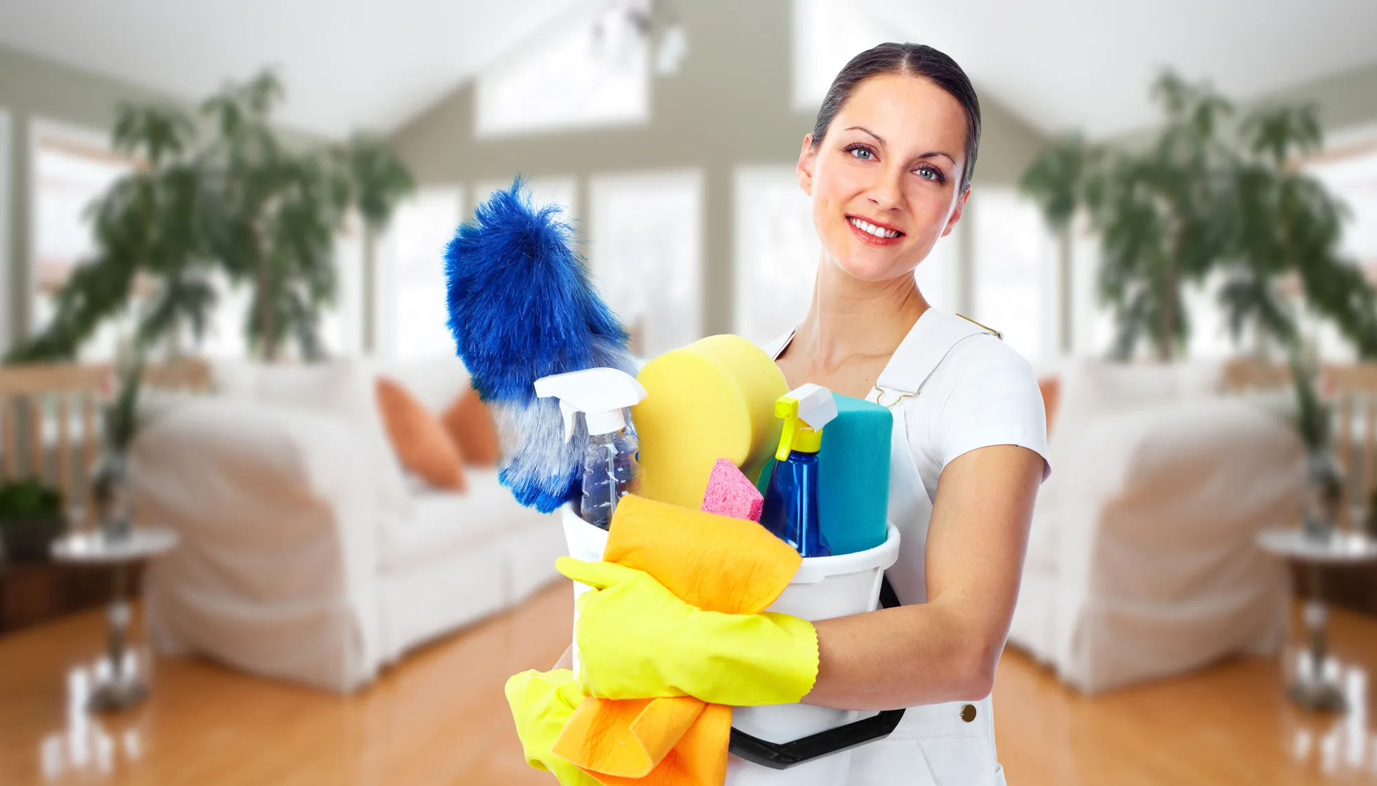 Cleaning crew hand-detailing hard floors in a South Florida home